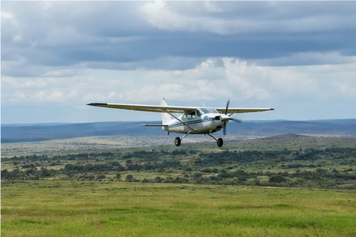 Light aircraft at an East African safari airstrip