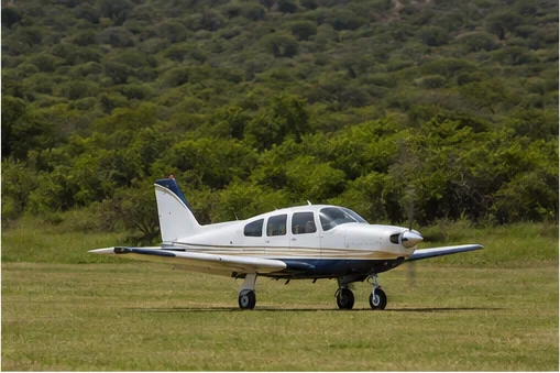 Light aircraft at an East African safari airstrip
